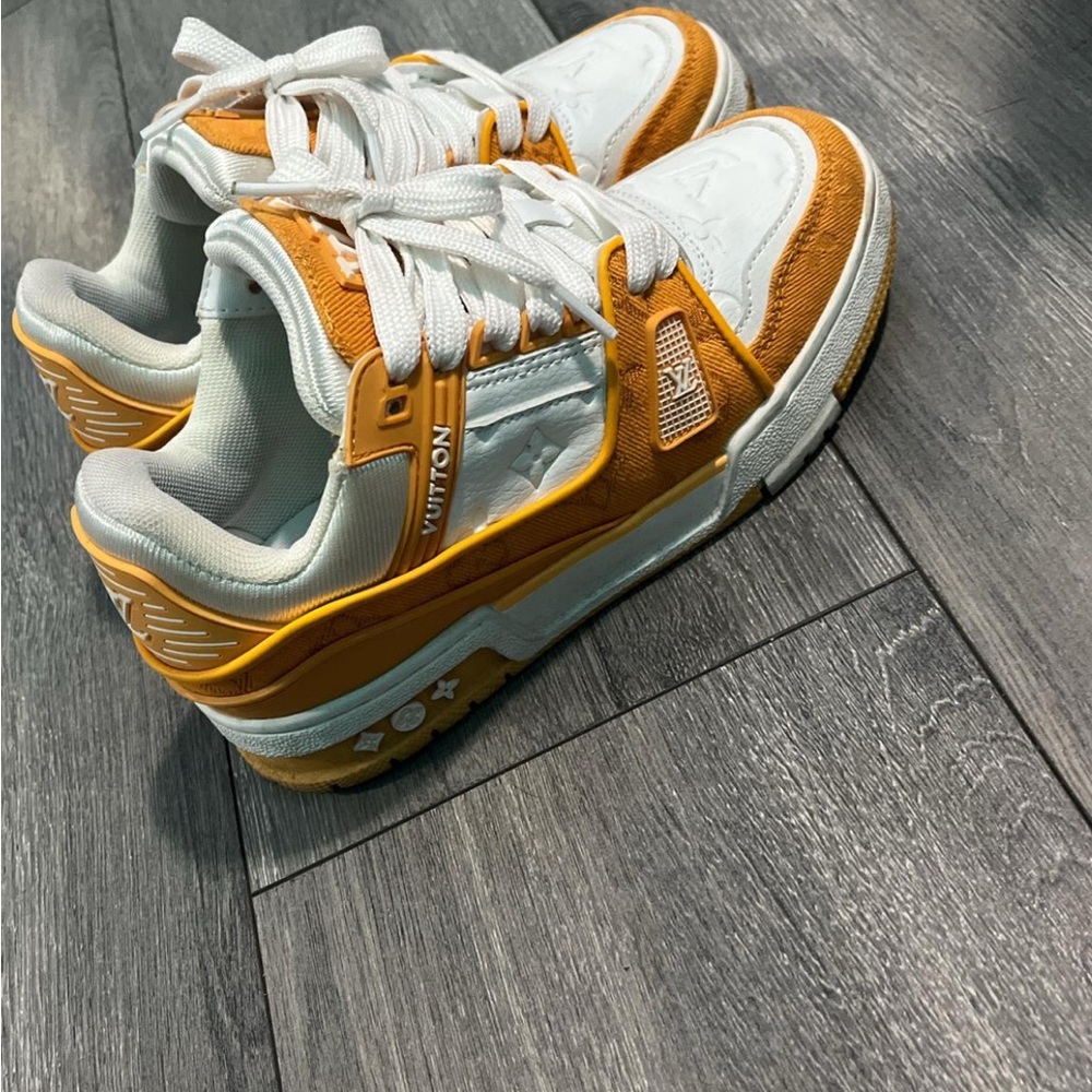 Louis Vuitton Orange and White Sneakers Vibrant Design